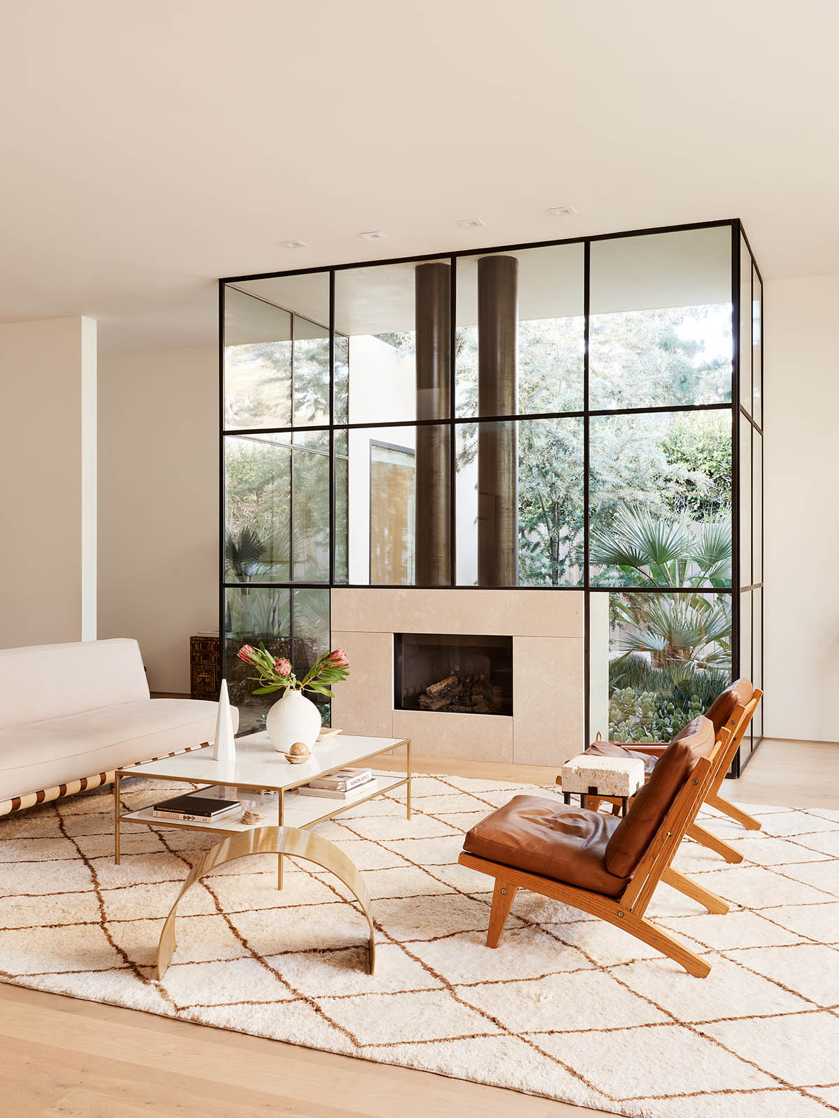 Rustic Canyon designed by Walker Workshop features light-filled and creamy interiors in Los Angeles