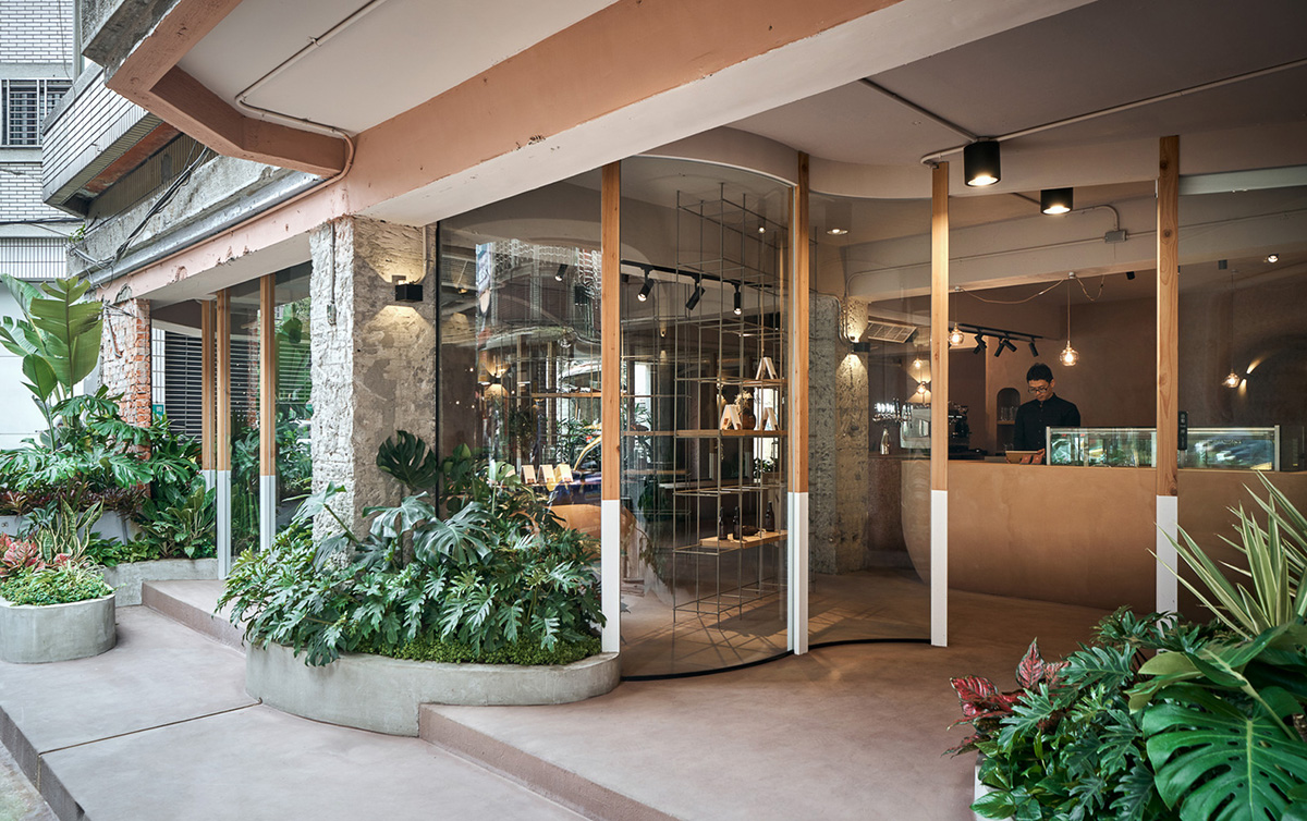 Soar Design Studio adds greenery and smooth surfaces to chocolate store offering garden-like space