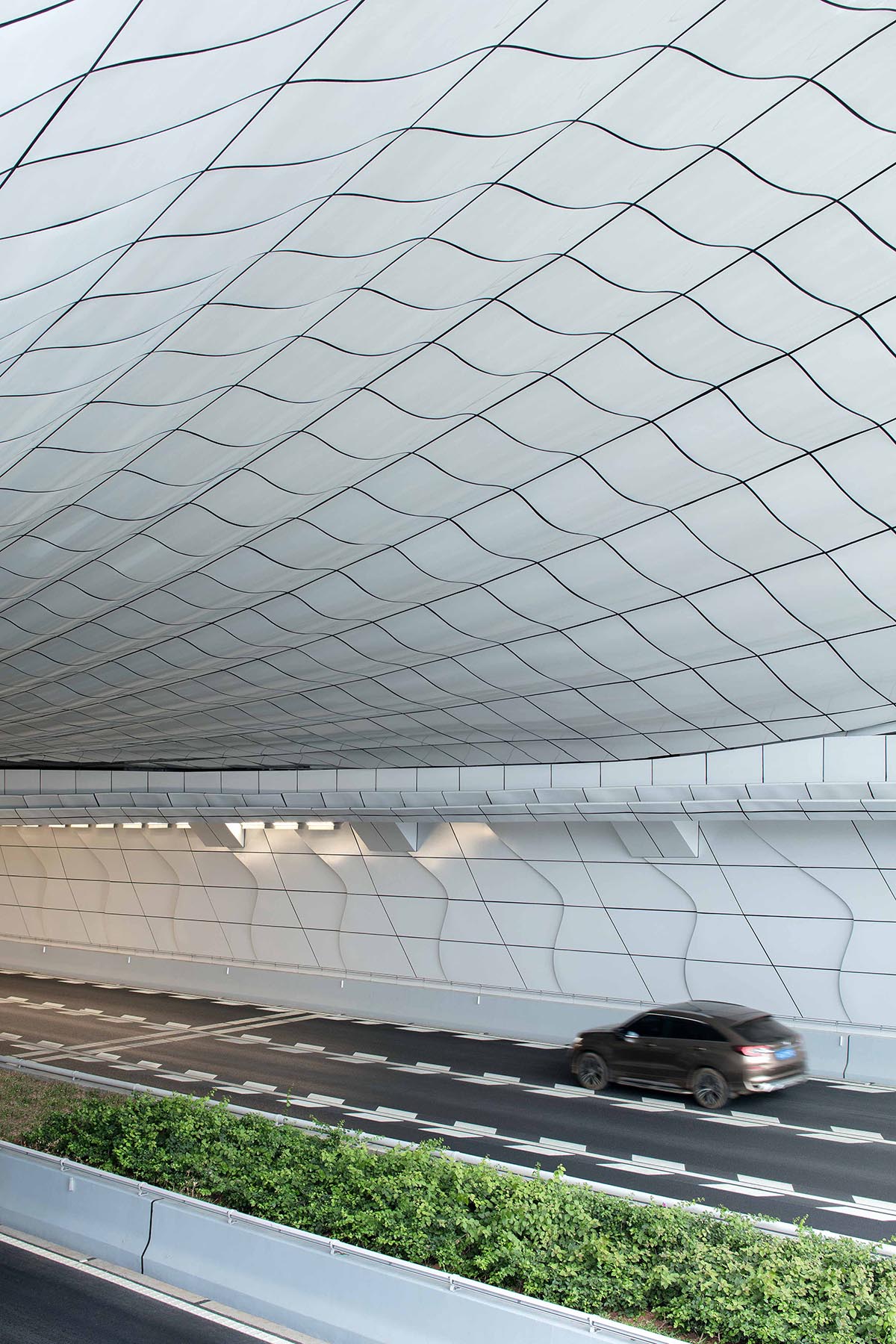 Penda China completes madeleine-shaped portal for Haikou Wenming East Road Tunnel in China