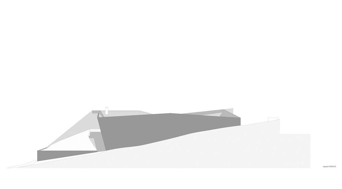 Contaminar Arquitectos built cave-like house from irregular walls inspired by rocky topography