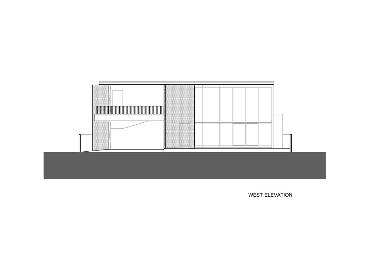 Gigantic terracotta-tile walls added to create a buffer zone in Pakkret House in Thailand