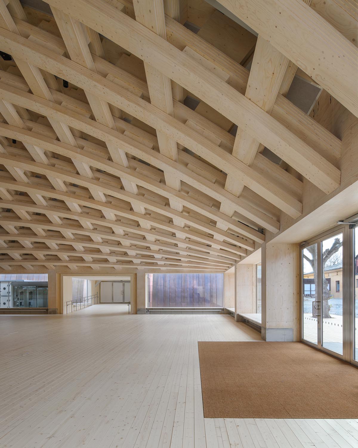 Elding Oscarson cria um espaço esférico com cúpula CLT como extensão de um museu em Estocolmo