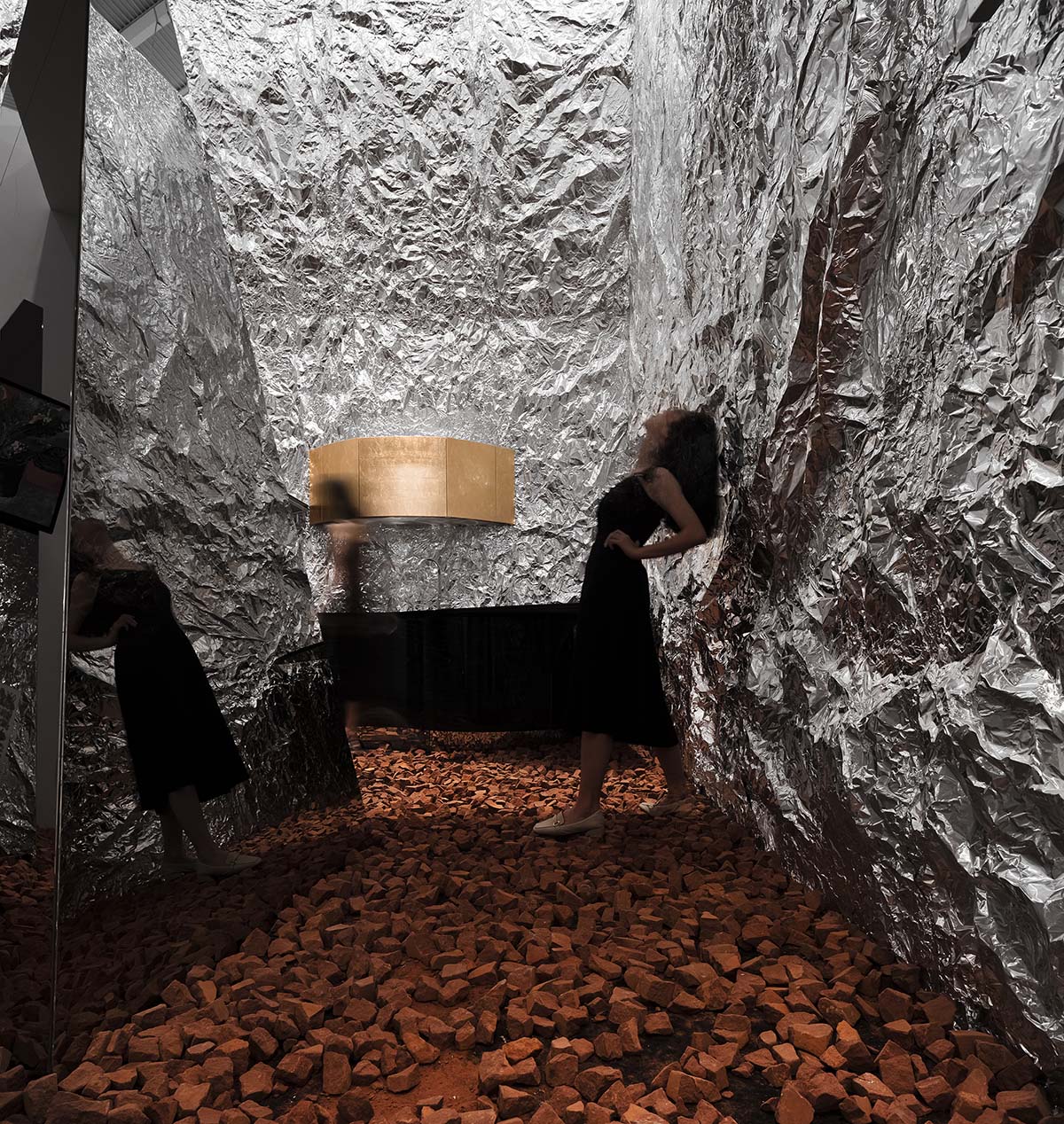 AD ARCHITECTURE creates metallic interiors for Mirror Gallery exhibition space in Shenzhen