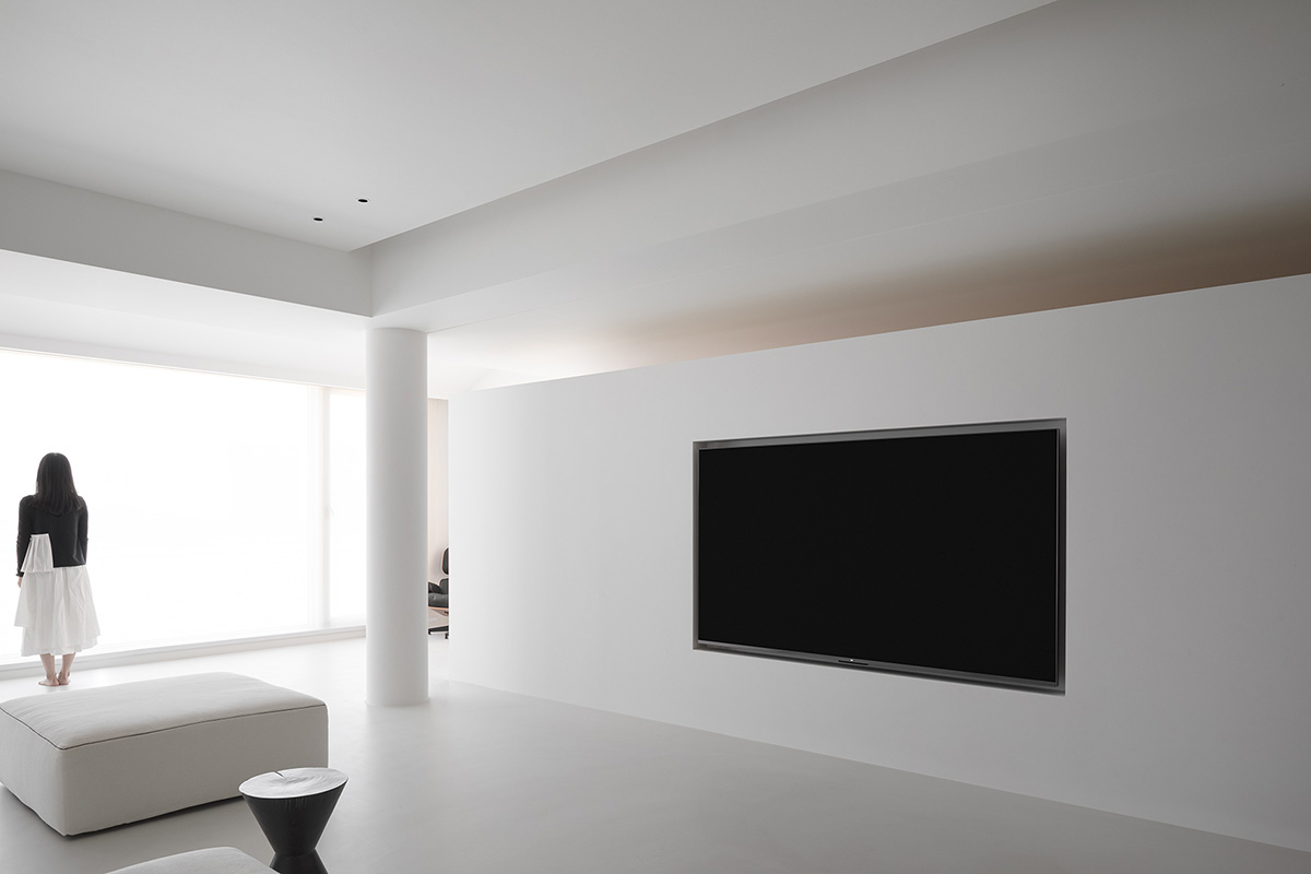 AD ARCHITECTURE creates all-white interiors with geometric compositions for L Apartment in China