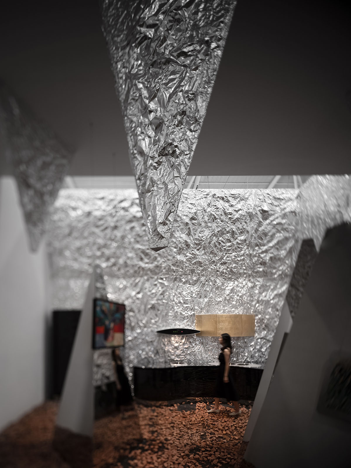 AD ARCHITECTURE creates metallic interiors for Mirror Gallery exhibition space in Shenzhen