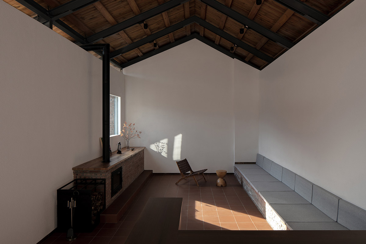 REDe Architects and Moguang Studio add red circular platform to renovated youth activity center