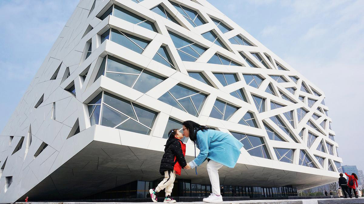 Henning Larsen Architects completes opera house featuring ice cracking elements on façade in Yuhang