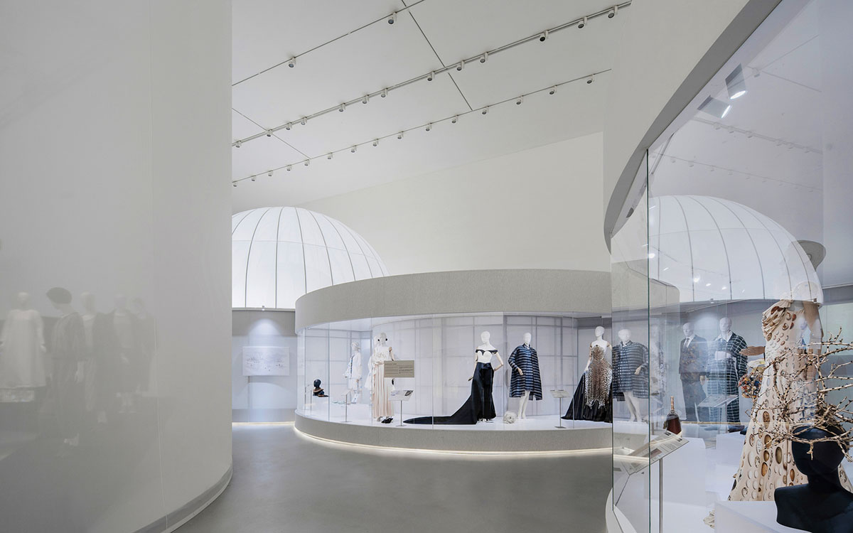 Studio 10 designs exhibition space with white tubular structures and black translucent ramps in China