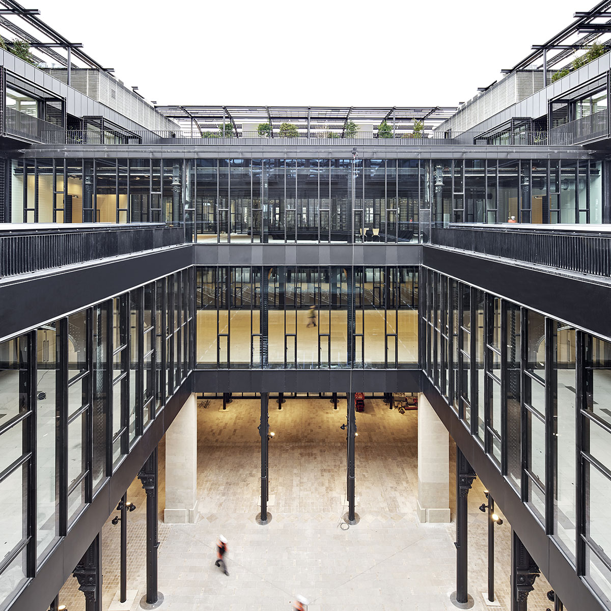 Dominique Perrault Architecture converts Paris' industrial post office building into mixed-use block
