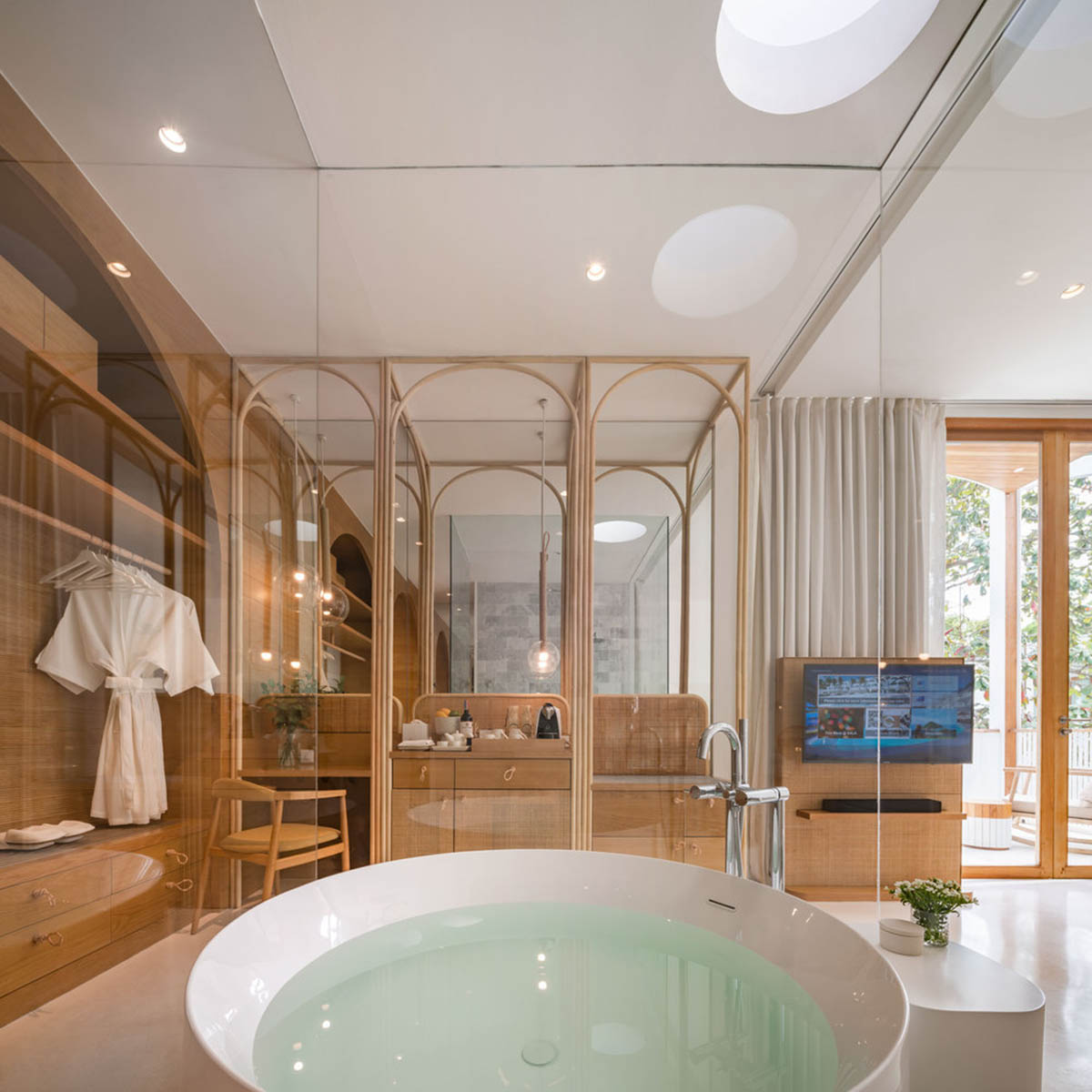 onion combines white concave and convex walls with colorful surfaces for beach resort in Thailand