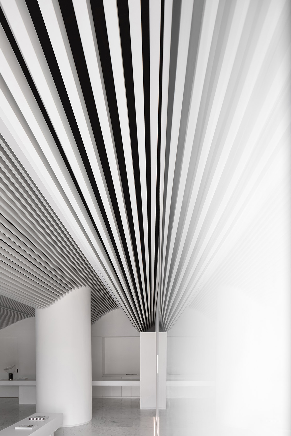 Runxuan Textile Office features white-toned interiors reinterpreted from production process of cloth