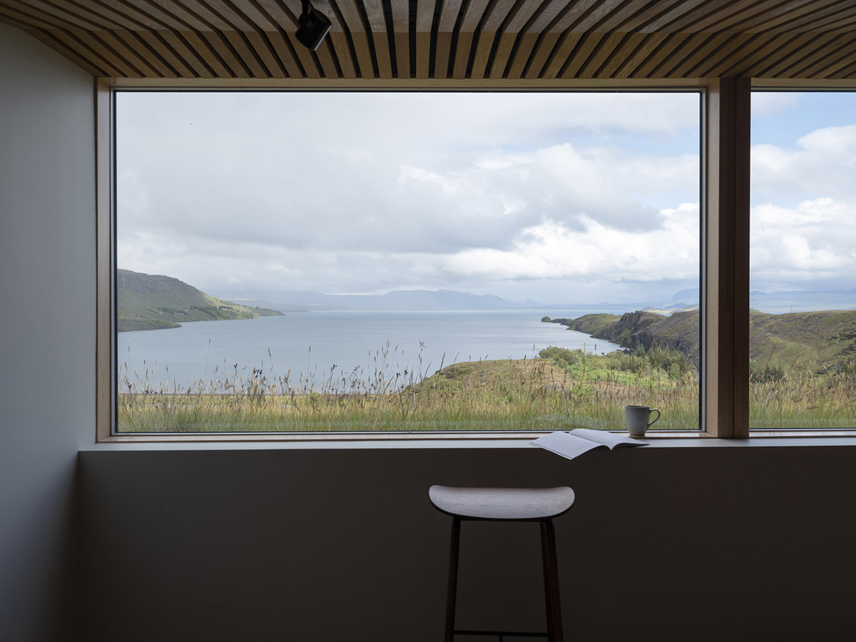 KRADS completes holiday home with inclined green roof towards the great Lake Þingvallavatn in Iceland