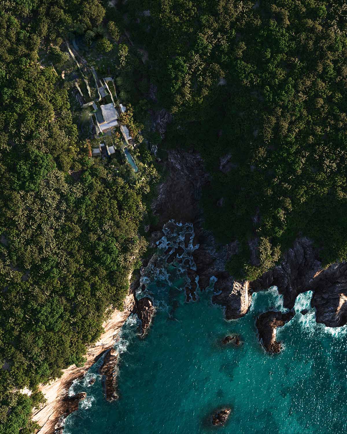 Jean Nouvel-designed new glass retreat that reflects rain and shadow on the Yakushima island