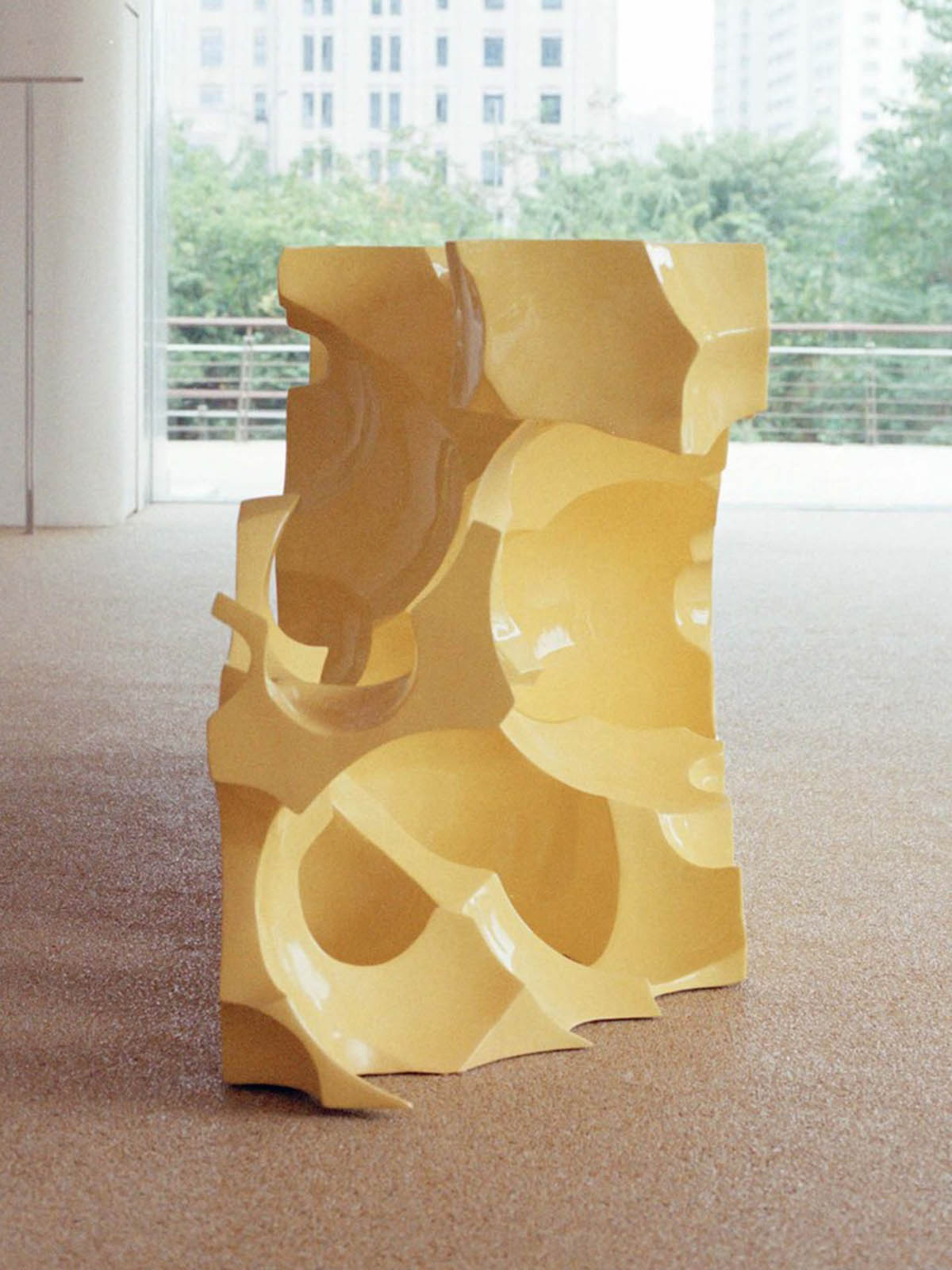 Cheese-like and stone tables with pinkish quirky-shaped elements add more personality to DSC store