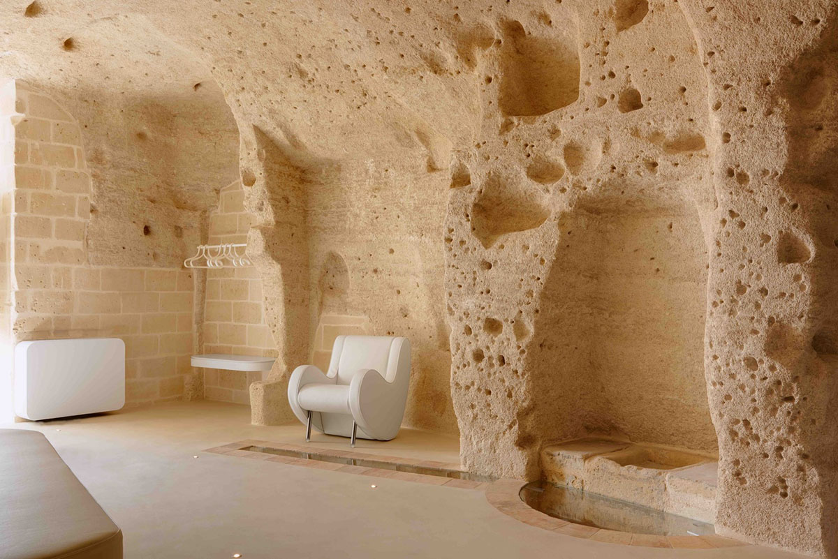 Interiors of this cave hotel and spa by Simone Micheli act like work of art with excavated surfaces