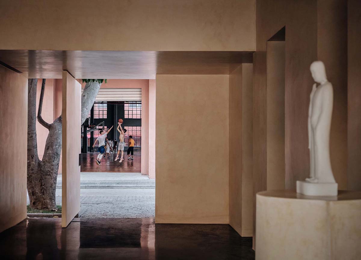 Ladder-Like sandalwood yellow volumes form Buddha artist's exhibition space and studio in China