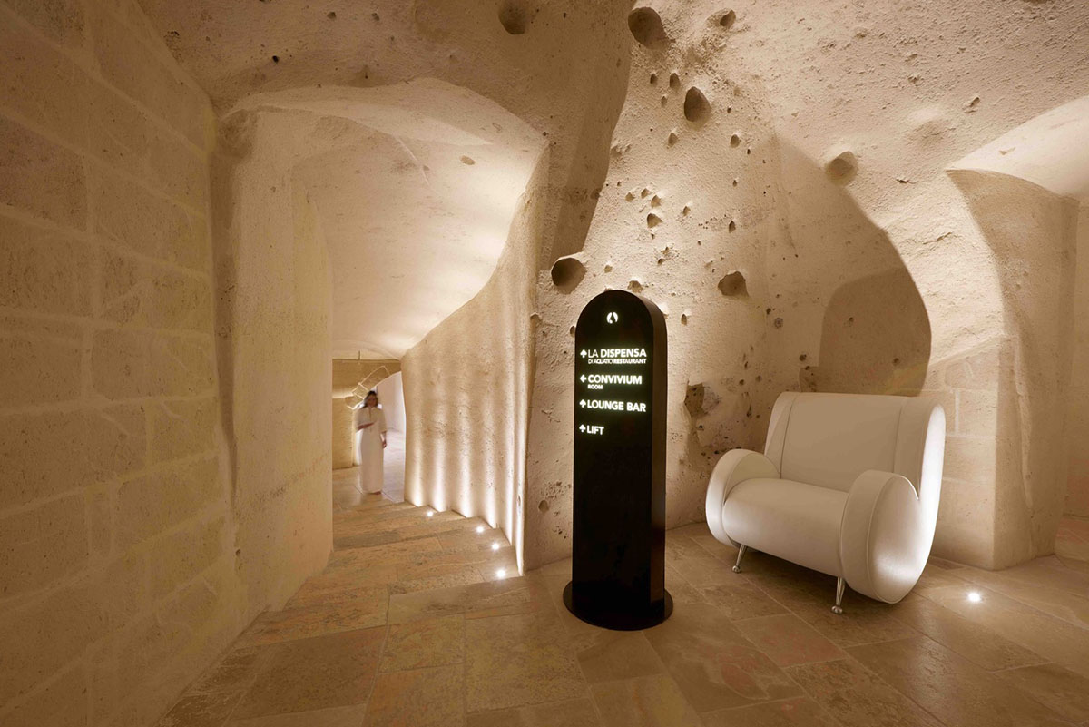 Interiors of this cave hotel and spa by Simone Micheli act like work of art with excavated surfaces