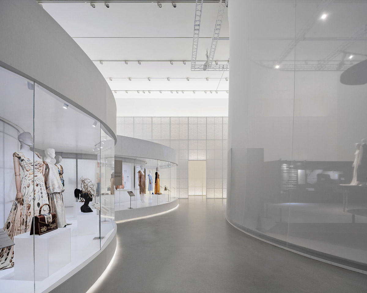 Studio 10 designs exhibition space with white tubular structures and black translucent ramps in China