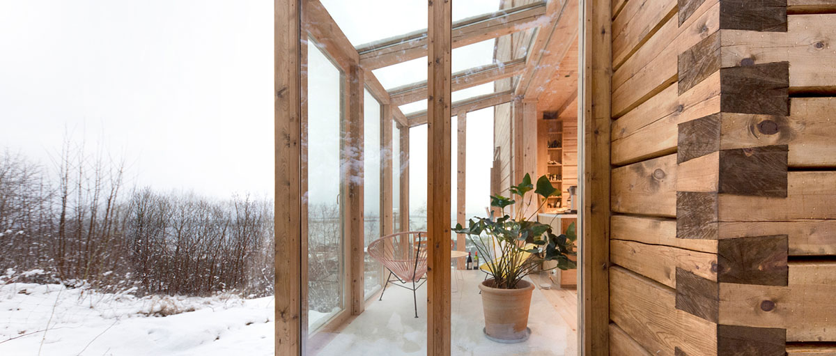 High windows allow users to get well-lit living spaces for this house by Rever & Drage Architects