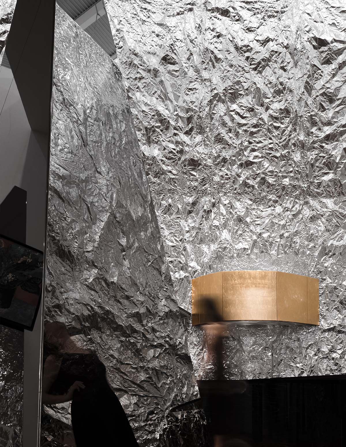 AD ARCHITECTURE creates metallic interiors for Mirror Gallery exhibition space in Shenzhen