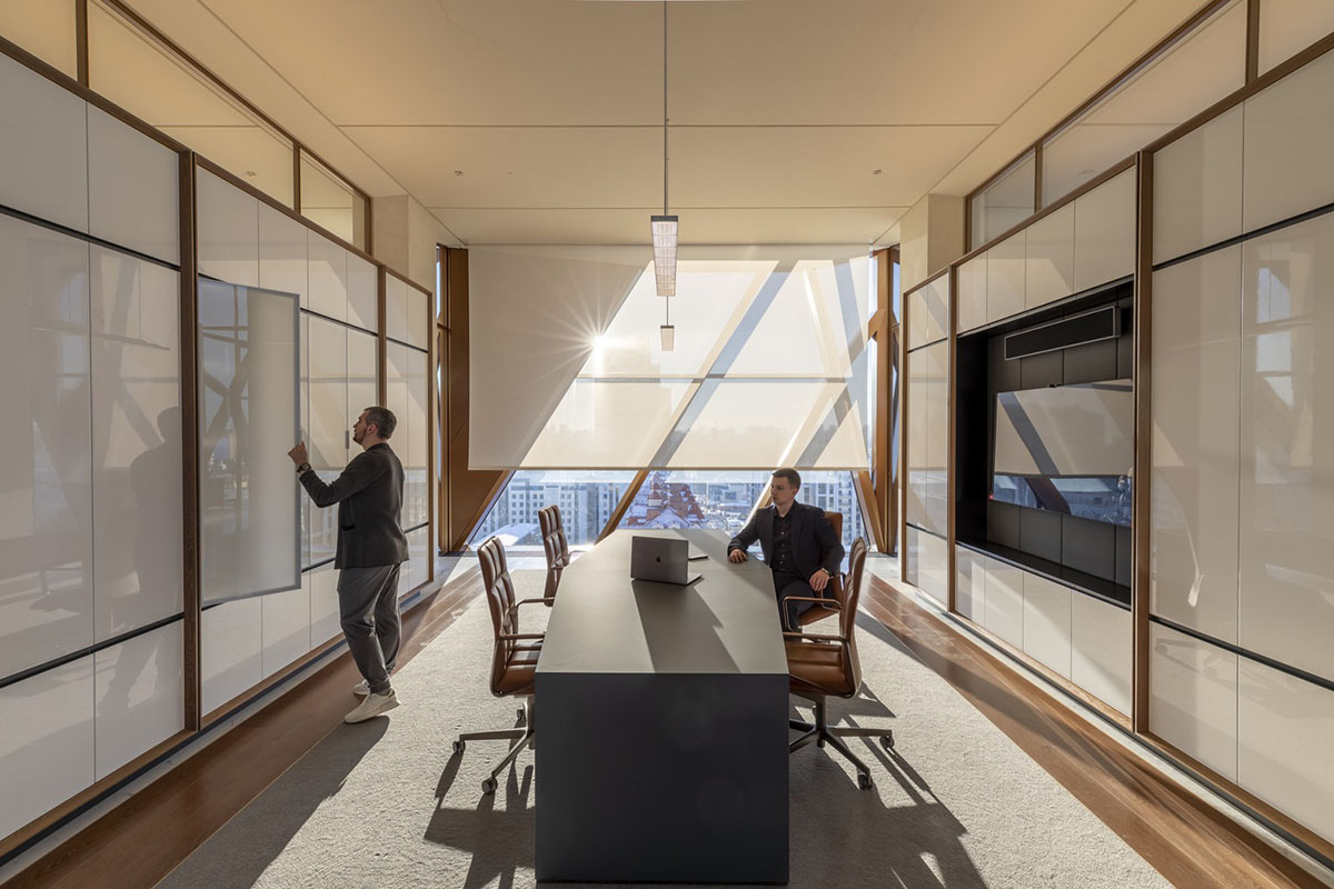 Foster + Partners completes office tower clad by triangular pieces of copper in Yekaterinburg