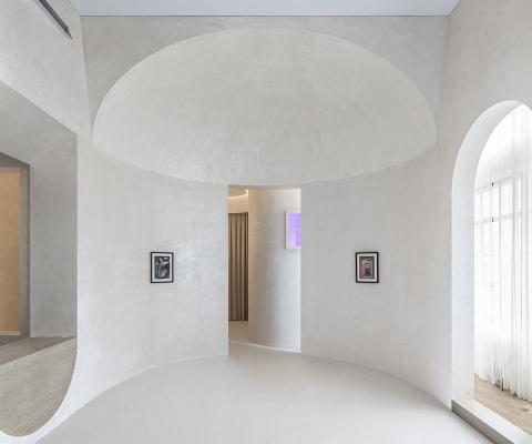 EVD designs its office that features classical aesthetics with arched ...