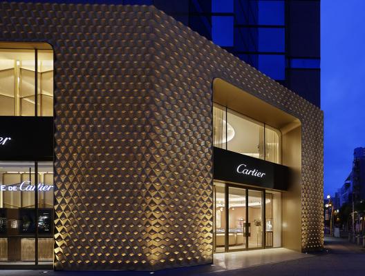 Wooden interlocking diamonds form this Cartier store designed by Klein ...